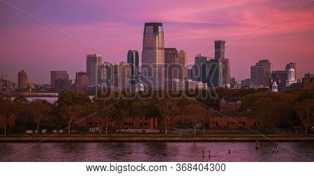 American East Cost. New Jersey State Jersey City Skyline During Scenic Sunrise. United States Of Ame