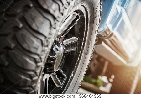 Performance Off Roading Theme. Deep Tread Of Off Road Tires To Provide More Traction On Unpaved Surf