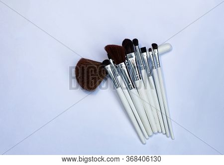 Set Of Makeup Brushes  On A Light Background
