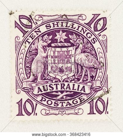 Seattle Washington - May 27, 2020:  Australian Coat Of Arms 10 Shilling Stamp Featuring Purple Shiel