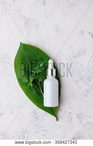 Natural Serums In White Glass Bottle. Concept Of Cosmetic Injection Is Hyaluronic Acid, Botulin, Ser