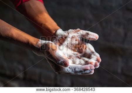 Washing Hands.man Washing His Hands In The Garden At Home. Corona Virus Pandemic Prevention Wash Han