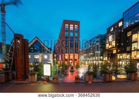 Tallinn, Estonia - December 5, 2016: View Of Historical Rotermann City With Fir Tree In Evening Illu