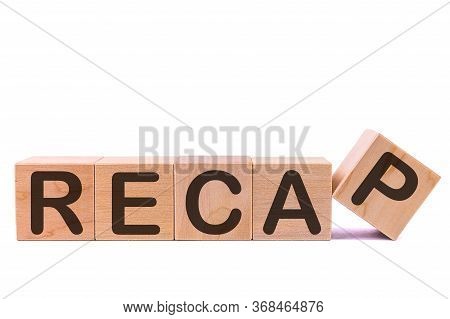 Word Recap Is Made Of Wooden Building Blocks Lying On The Table And On A Light Background. Concept.