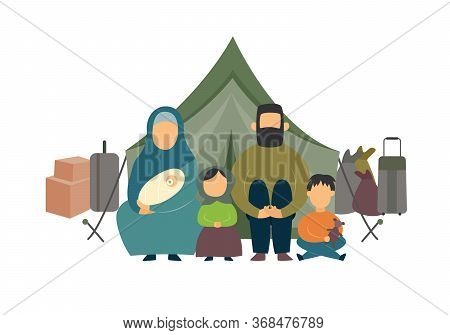 Homeless Family Of Parents And Kids Sitting Near Luggage And Tent In A Refugee Camp.