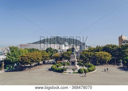 Busan, South Korea, September 14, 2019: View Of Cityscape From Yongdusan Park Square With Admiral Yi