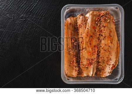 Smoked Marinated Mackerel Fillet Or Fillet Herring Fish With Spices Packed In Box On Slate Stone Bac