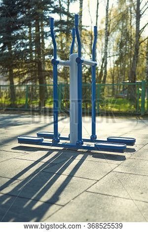 Empty Street Exercise Machines In A Public Place. The Concept Of Ban On Walking.