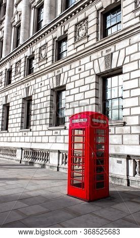 Red Phone Box In London, United Kingdom,the Back Is The Building