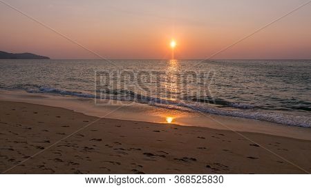 Sunset And Reflection Of Sun On A Beach - Phuket / Thailand