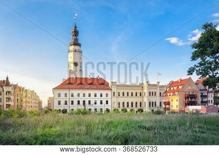 Glogow, Lower Silesia, Poland. Historic Town Hall Building With Clock Tower
