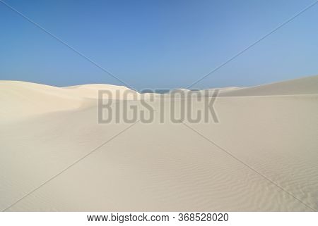 Big White Sand Dunes At Aomak Beach At Sunset, Socotra Island, Yemen. The Protected Area Of Aomak Be