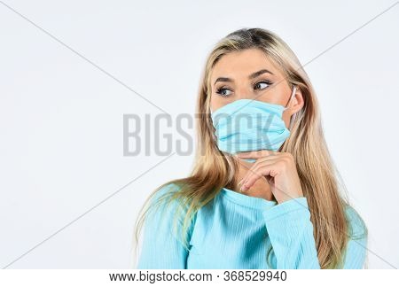 Blonde Female Wear Medical Mask On Face. Fit Woman Wear Protective Mask. Coronavirus Health Protecti
