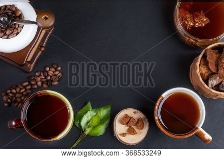 Preparation Chaga Mushroom Coffee. Ceramic Cups, Glass Jar With Chaga Drink, Coffee Grinder, Chaga P