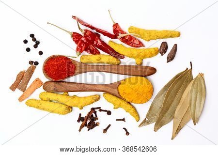 Kitchen Table With Spices And Dry Herbs