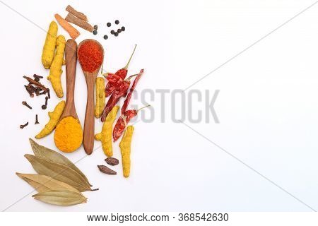 Kitchen Table With Spices And Dry Herbs