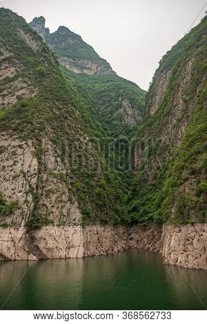 Wushan, Hubei, China - May 7, 2010: Wu Gorge In Yangtze River. Shoreline Split Forms Steep Short Can