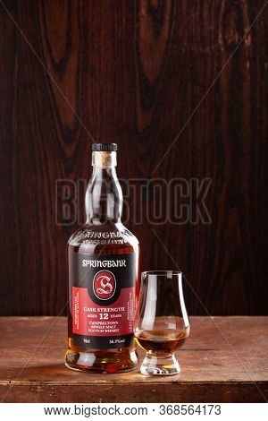 Trondheim, Norway - May 20 2020: Springbank single malt scotch whisky bottle and glass