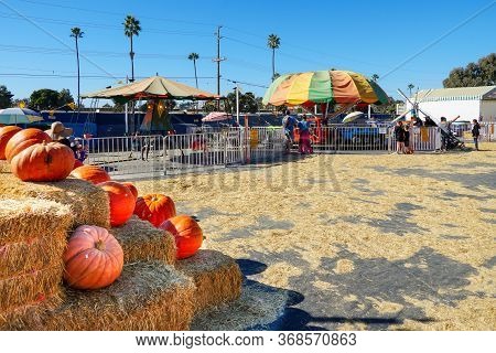 Kiddie Rides, Slides, Inflatable Play Centers At Halloween Fair, San Diego, California, Usa, October
