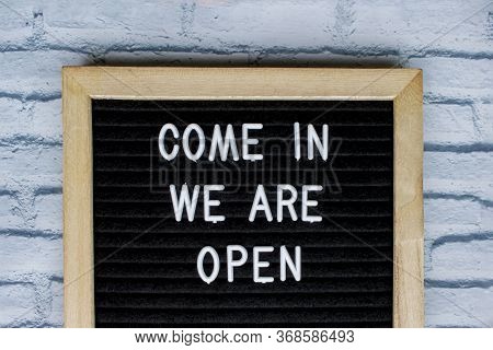Come In We Are Open, Message On A Blackboard