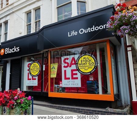 Llandudno, Uk: Aug 27, 2019: A Blacks Outdoor Clothing And Equipment Store With Window Banners Adver