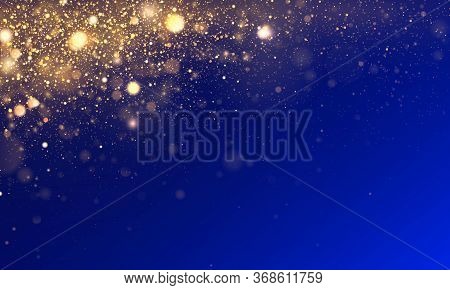 Bokeh Effect. Blue Texture Glitter And Elegant For Christmas. Sparkling Magical Gold Yellow Dust Par