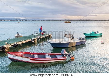 San Juan, Puerto Rico - April 30, 2019: Fishing Boats Moored Near The Shore Of San Juan, Puerto Rico