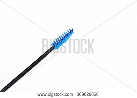 Blue And Black Yelash Brush In Hand Girl Master Eyelash Extension.