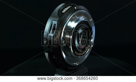 Tomsk, Russia - May 28, 2020: Metabones Speedbooster 0.71 Ultra Standing On A Black Turntable, Micro