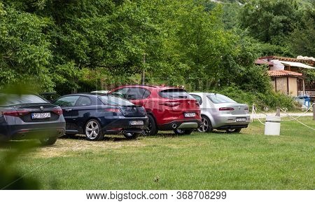 Blato,croatia May 2020
Rear View Of Multiple Alfa Romeos Parked On A Car Show. Stelvio, 159, Gt And 