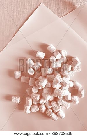 Marshmello On A Surface Of Different Colors