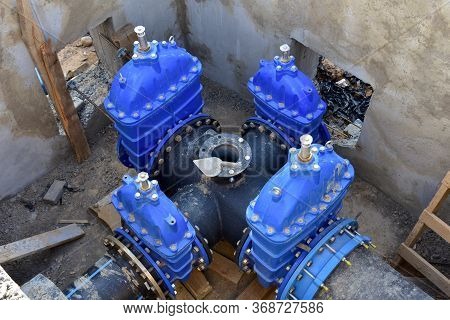 Resilient Seated Gate Valves Connect Pipeline Of Water Supply In Concrete Bunker At Constructin Site