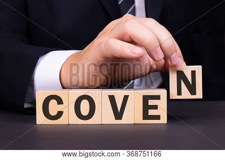 Man Made Word Coven With Wooden Blocks. Business Concept.