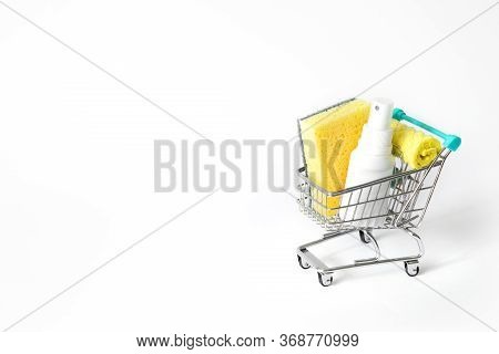 Shopping Cart With Detergents And Sponges For Dishes. Free Space For Text