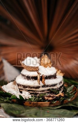 Brazilian Traditional Dessert: Sweet Couscous Tapioca Pudding Cuscuz Doce With Coconut On Wooden Boa