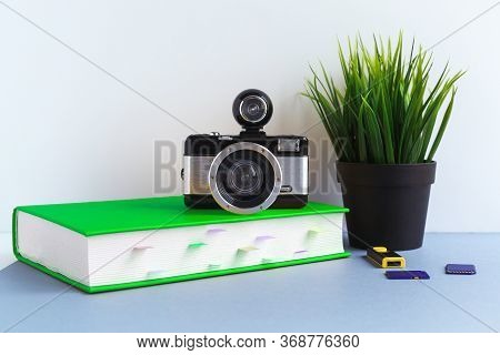 The Concept Of Studying Photography, Camera And Texbook