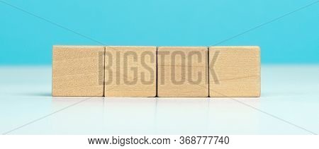 Wooden Blocks On Blue Background. Success, Growth, Win, Victory, Development Or Top Ranking Concept