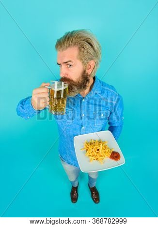 Man With Fastfood. French Fries In Restaurant. Bearded Guy With Snack. Fast Food, Unhealthy Eating, 