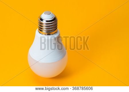 Led, New Technology Light Bulb On Yellow Background, Energy Super Saving Electric Lamp Is Good For E