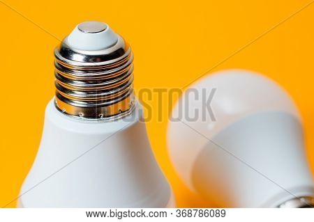 Led, New Technology Light Bulb On Yellow Background, Energy Super Saving Electric Lamp Is Good For E