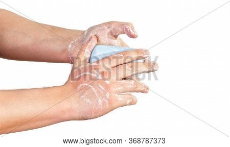 Young Man Wash Hands With Soapbar, Closeup Detail On Soap Bubbles, Isolated On White. Can Be Used Du