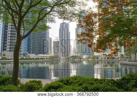 Dubai / Uae - May 26, 2020: View Of Jumeirah Lakes Towers Skyscrapers With Artificial Lake. Resident
