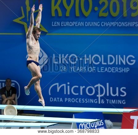 Kyiv, Ukraine - August 7, 2019: Oleg Kolodiy Of Ukraine Performs During Mens 1m Springboard Final Of