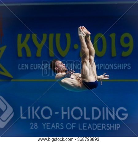 Kyiv, Ukraine - August 7, 2019: Oleg Kolodiy Of Ukraine Performs During Mens 1m Springboard Final Of