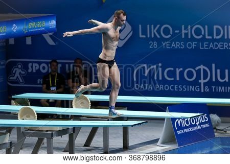 Kyiv, Ukraine - August 7, 2019: Stanislav Oliferchyk Of Ukraine Performs During Mens 1m Springboard 