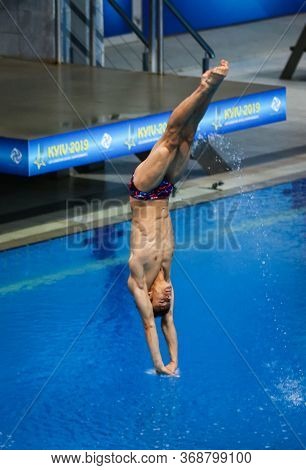 Kyiv, Ukraine - August 9, 2019: Jonathan Suckow Of Switzerland Performs During Mens 3m Springboard F