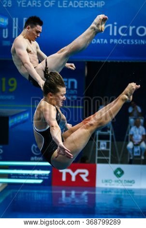 Kyiv, Ukraine - August 6, 2019: Tina Punzel And Lou Massenberg Of Germany Perform During Mixed 3m Sy
