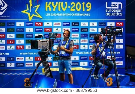 Kyiv, Ukraine - August 6, 2019: Videographers At Work During The Womens 10m Platform Final Of The 20