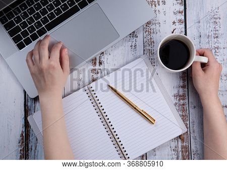 Young Woman Working With A Laptop During Isolation Or Quarantine.