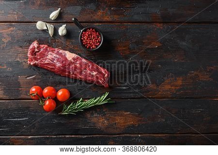 Organic Machete Steak Or Hanging Tende Cut, With Rosemary Over Wood Background Top View Space For Te